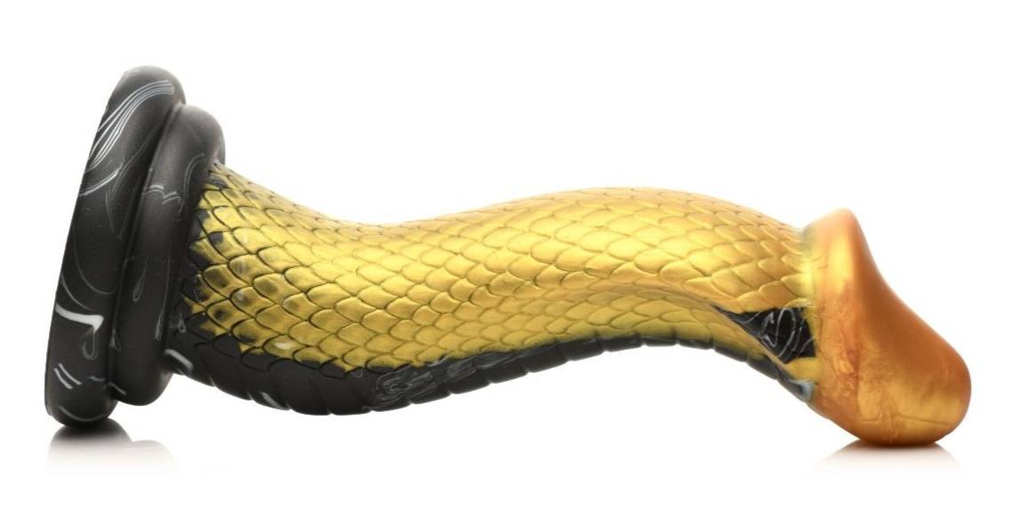 gold and black textured dildo on a white background
