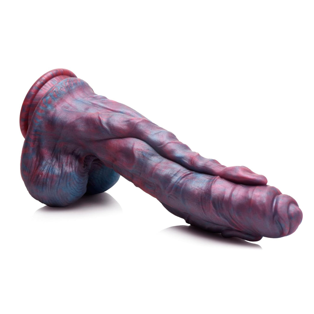 Marbled purple and blue creature dildo on a white background