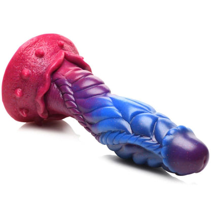 Pink and blue silicone sex toy on a white background
