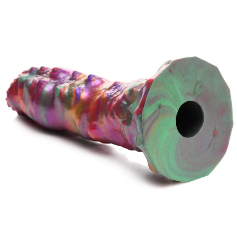 Colorful textured fantasy dildo on a white background