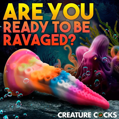 Colorful jellyfish-like creature with text 'Are you ready to be ravaged?' and 'Creature Cocks' logo.