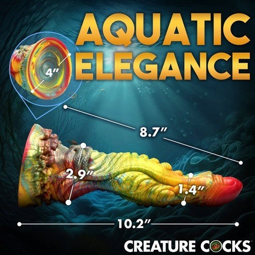 Colorful creature cock with measurements on a dark underwater-themed background, featuring the brand 'Creature Cocks'.