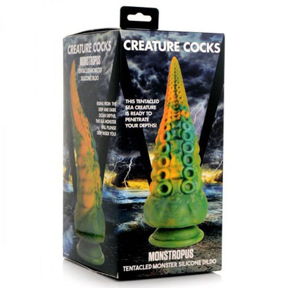 Silicone dildo packaging with 'Creature Cocks' branding on a white background