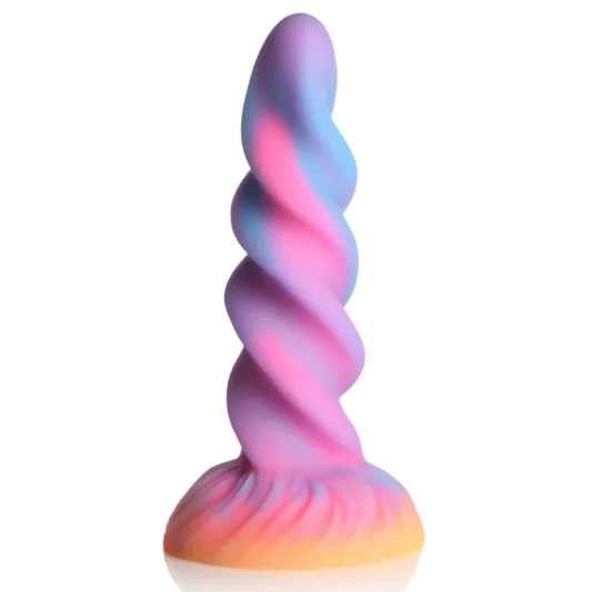 Colorful unicorn horn-shaped dildo on a white background