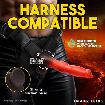 Product with text about harness compatibility and water-based lubricant, featuring a black harness and red suction cup.