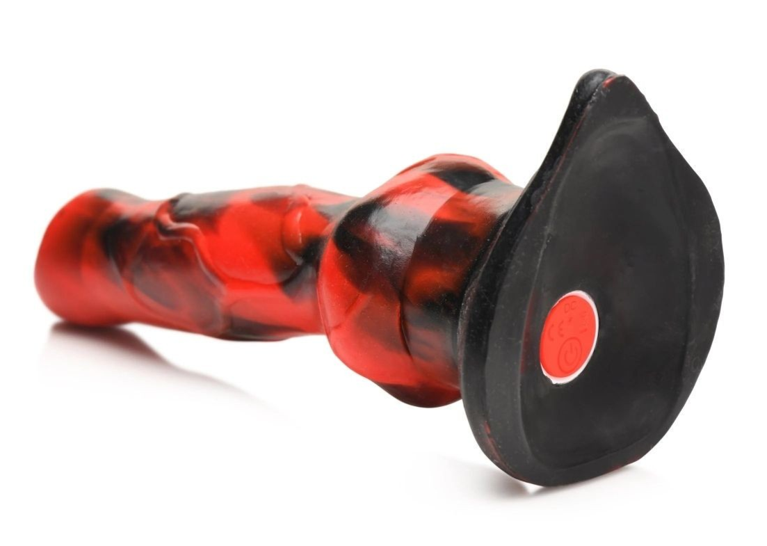 Red and black dildo on a white background