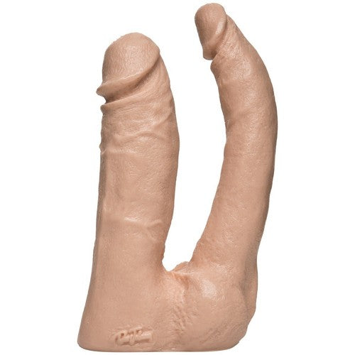 Realistic silicone model of a penis on a white background