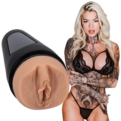 Product with a realistic design of a vulva next to a model of a woman with tattoos.