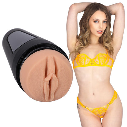 Woman in yellow lingerie with close-up of a masturbator on a white background