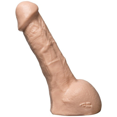 Realistic silicone model of a penis on a white background