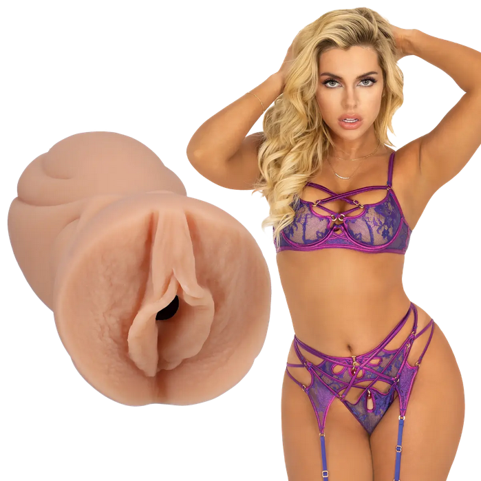 Woman in purple lingerie with a close-up of a silicone masturbator on a white background