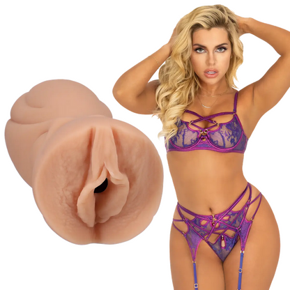Woman in purple lingerie with a close-up of a silicone masturbator on a white background