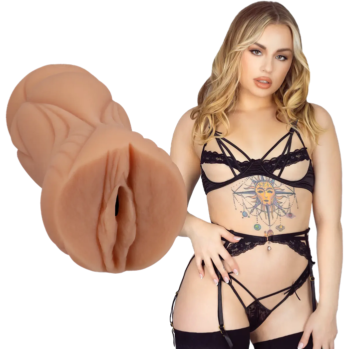 Woman in black lingerie with a close-up of a silicone stroker on a white background