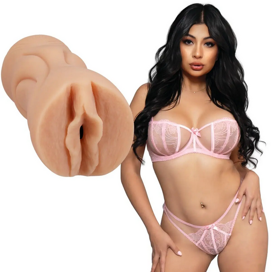 Woman wearing a pink lingerie set with a close-up of a silicone stroker on a white background
