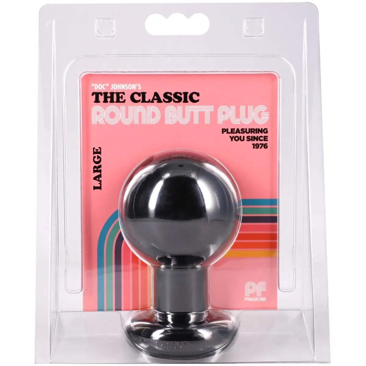 A black round butt plug in its original clear plastic blister packaging with a retro pink and orange paper insert card.