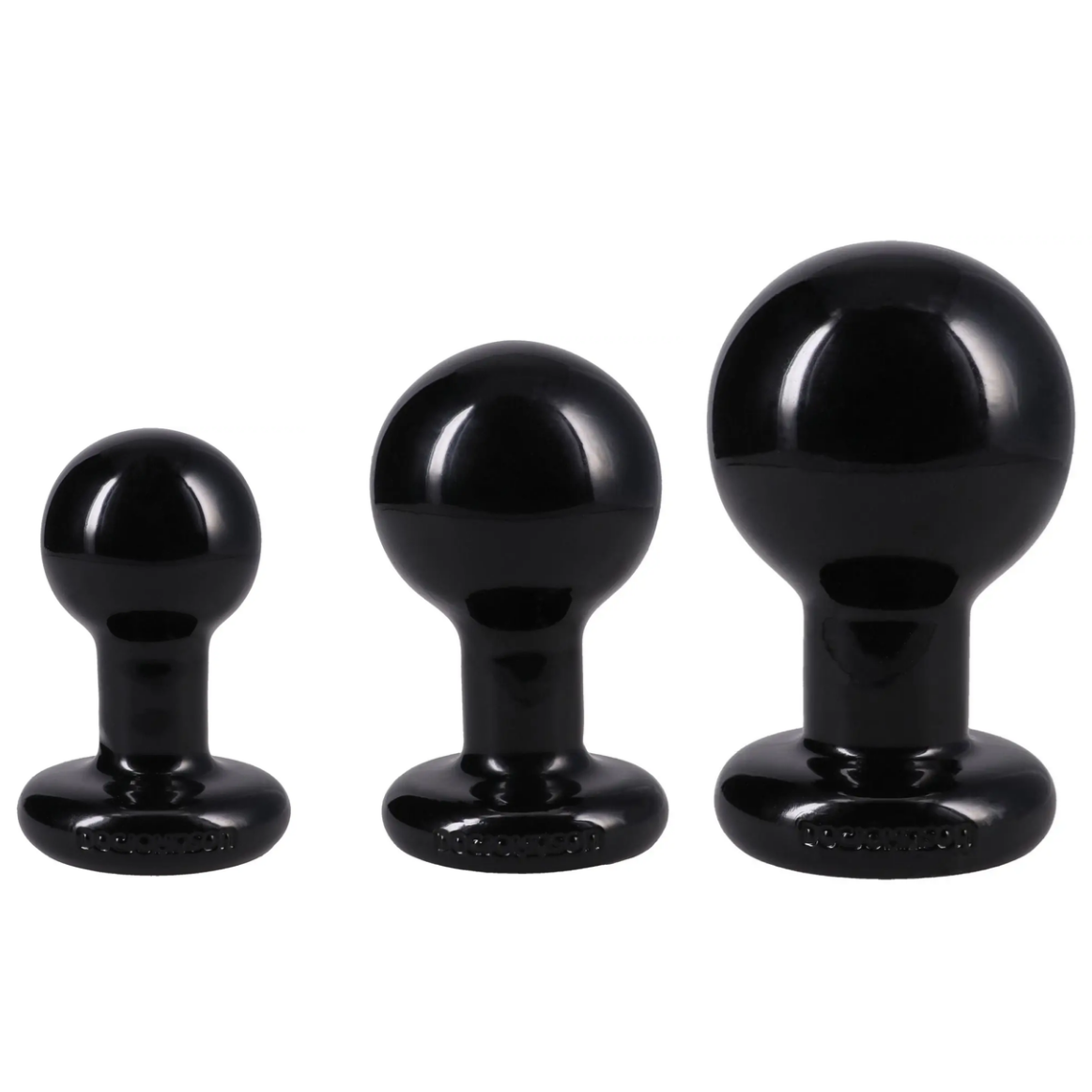 Three black silicone butt plugs in graduated sizes, arranged from smallest to largest against a plain white background.