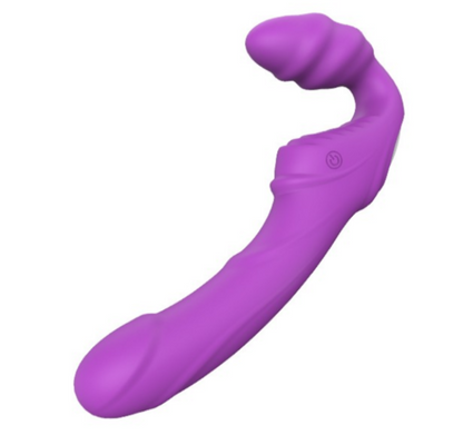 Purple silicone couples massage wand on a white background