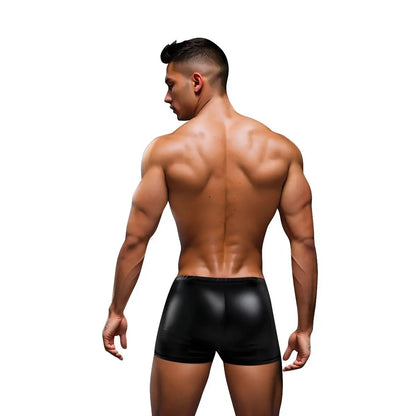 Man wearing black underwear against a white background