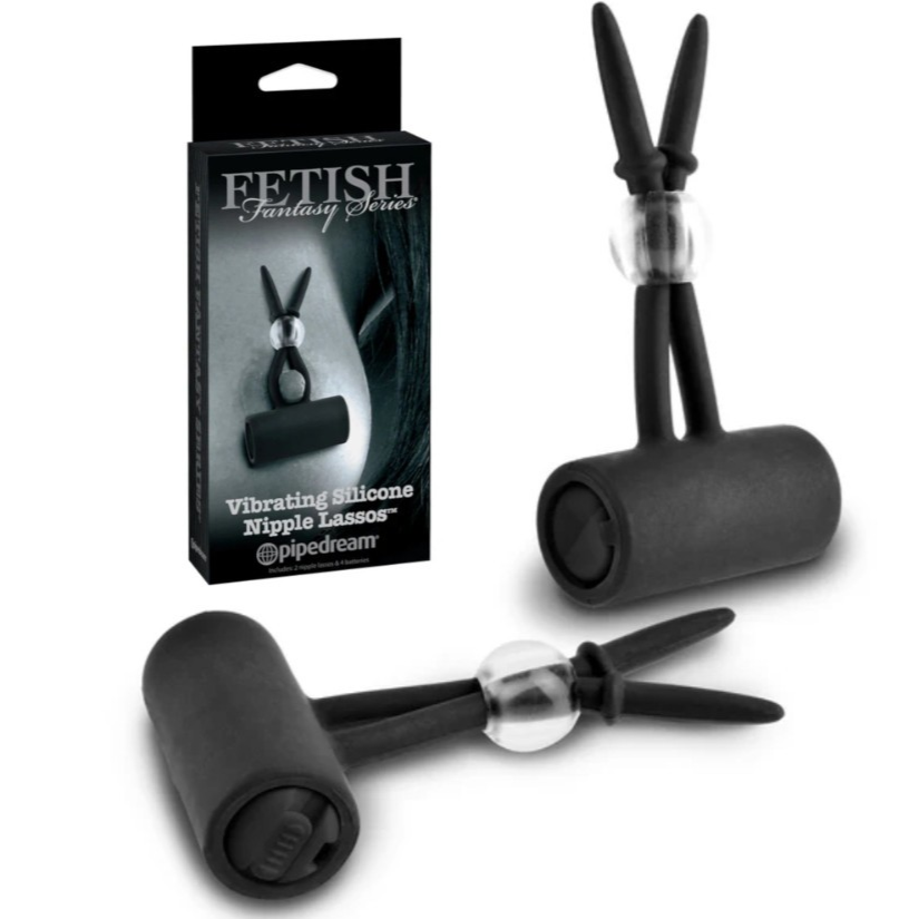 Black vibrating silicone nipple clamps with packaging on a white background