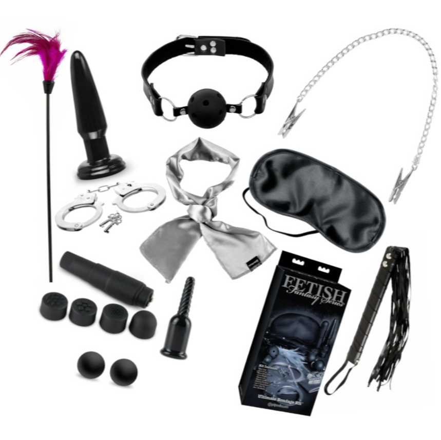Collection of various BDSM accessories on a white background