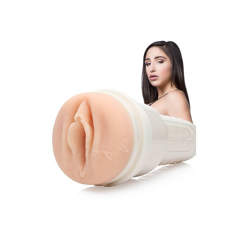 Woman holding a silicone pussy masturbator on a white background