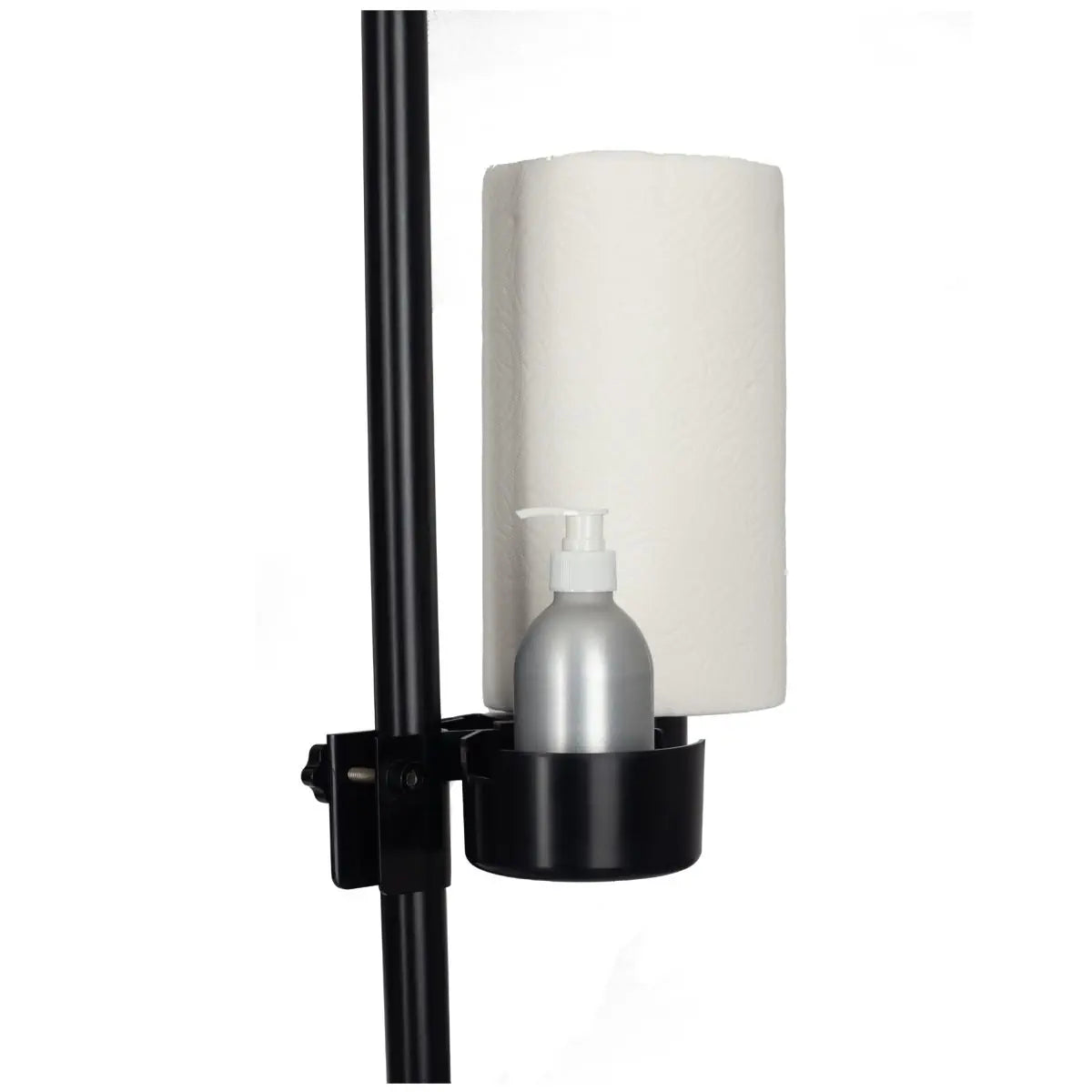 Black holder with paper towels and a bottle of lubricant.