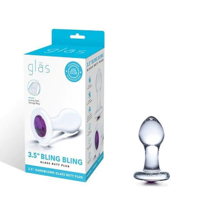 Glass butt plug with packaging labeled 'glas' on a white background