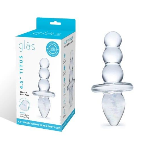 Clear glass butt plug with packaging labeled 'glas' on a white background