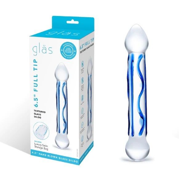 Glass dildo with packaging on a white background