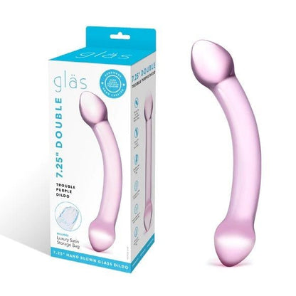 Pink glass dildo with packaging on a white background
