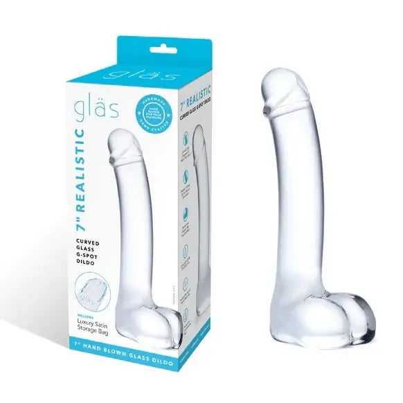 Clear glass dildo with packaging on a white background