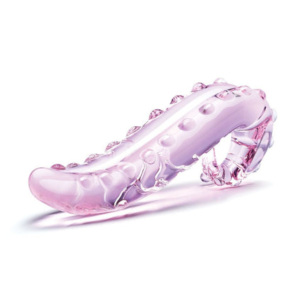 Pink and clear glass dildo on a white background