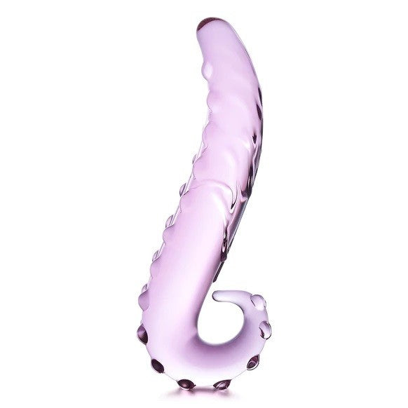 Purple glass octopus shaped dildo on a white background