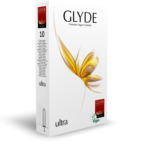 Glyde ultra condom packaging with a decorative flower on a white background