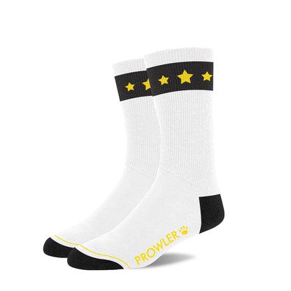 White socks with black accents and yellow stars on a white background