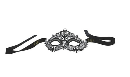 Black decorative mask with intricate designs on a white background