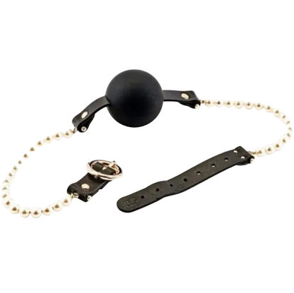 Black ball gag with a leather strap and pearl beaded chain on a white background