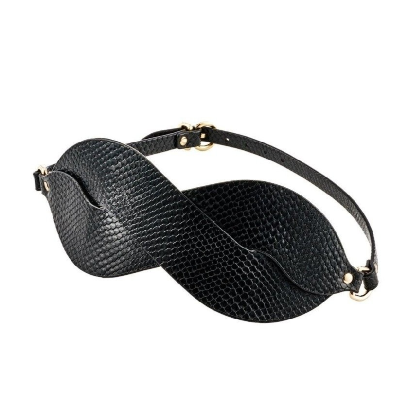 Black eye mask with a strap on a white background