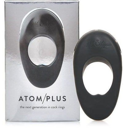 Black cock ring with packaging labeled 'ATOM/PLUS' on a white background