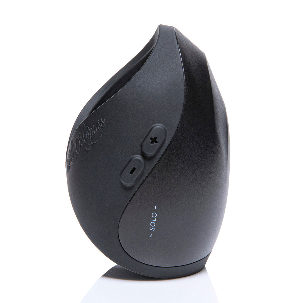 Black electronic masturbator with buttons on a white background