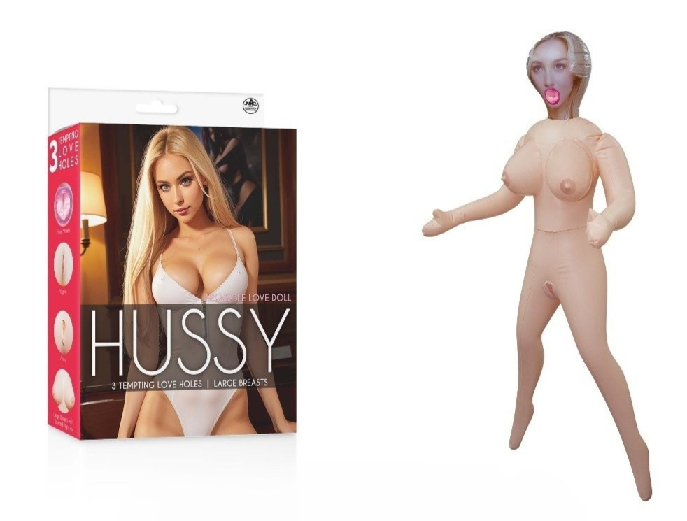 Sexual product packaging with a doll and 'Hussy' branding on a white background