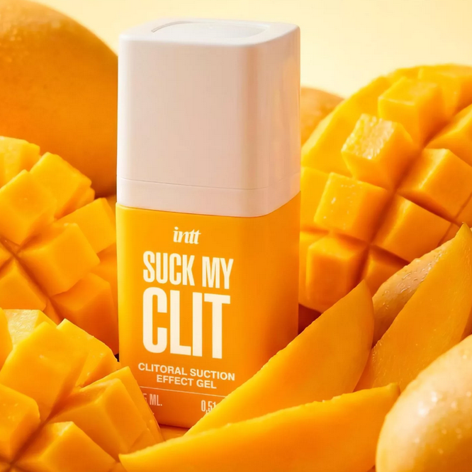 Gel container labeled 'Suck My Clit' surrounded by mangoes