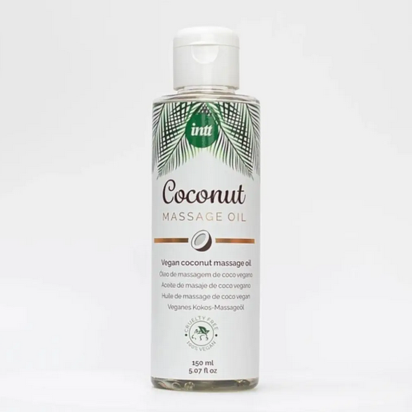 Coconut massage oil bottle with palm leaf design on a white background