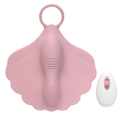 Pink silicone shell-shaped product with a remote control on a white background