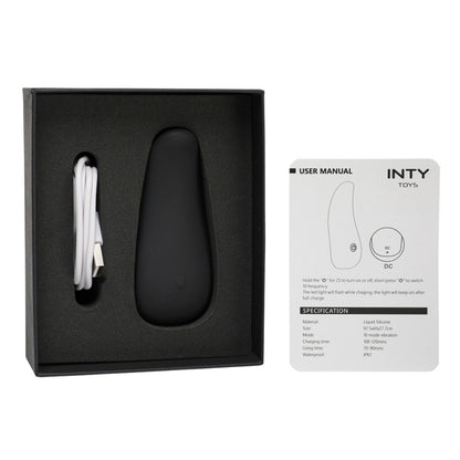 Black Inty Tickle vibrator with USB cable and user manual on a white background