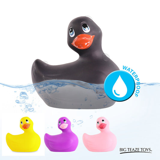 Black vibrating rubber duck with colorful ducklings on a white background, featuring the brand 'Big Teaze Toys'.