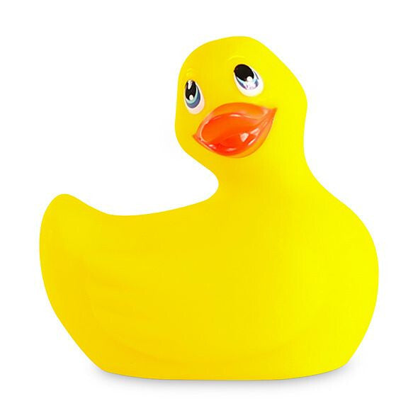 Yellow rubber duck with a red beak on a white background