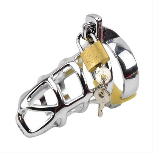 Metal penis muzzle with gold lock on a white background