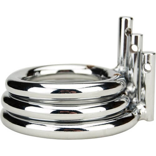 Metallic chastity device on a white background