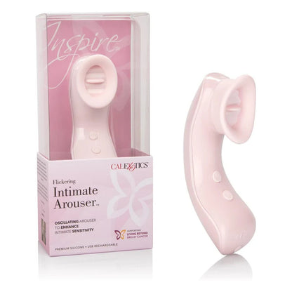 Pink intimate arousal device with packaging on a white background
